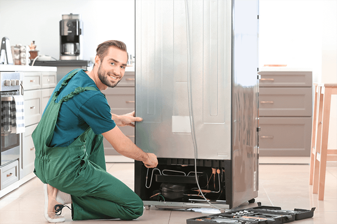 Professional refrigerator water filter replacement in Dubai - SRB Dubai installing new filter cartridge