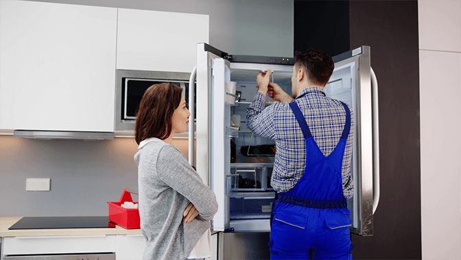 Dubai refrigerator control board repair - SRB Dubai replacing electronic control panel on a modern fridge