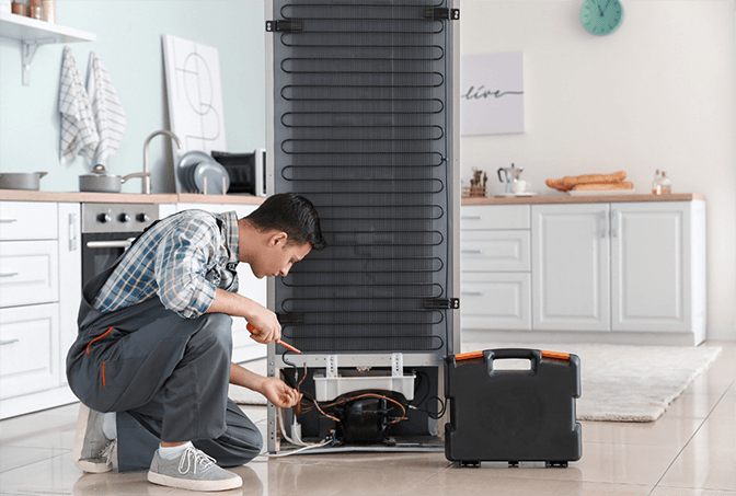 Dubai fridge door seal replacement service - SRB Dubai installing new gaskets on a Bosch refrigerator